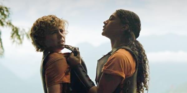 Clarisse holding Percy by his armor in Percy Jackson and the Olympians.