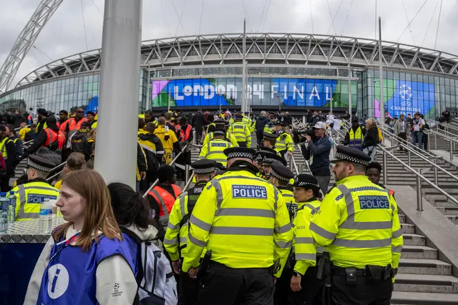 London, UK.  1 June 2024.  Police in attendance as Dortmund fans pass through ticket checks ahead of the Champions League Final between R